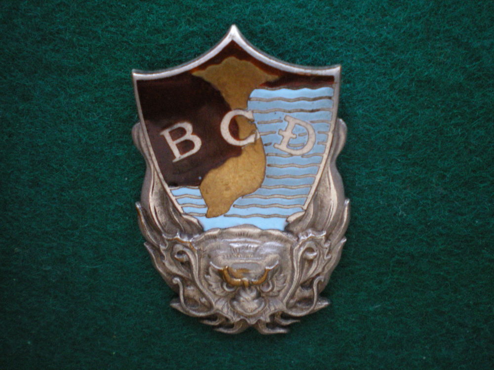 Insigne colonial - B.C.D. Corps de D&eacute;fense de l'Etat. 