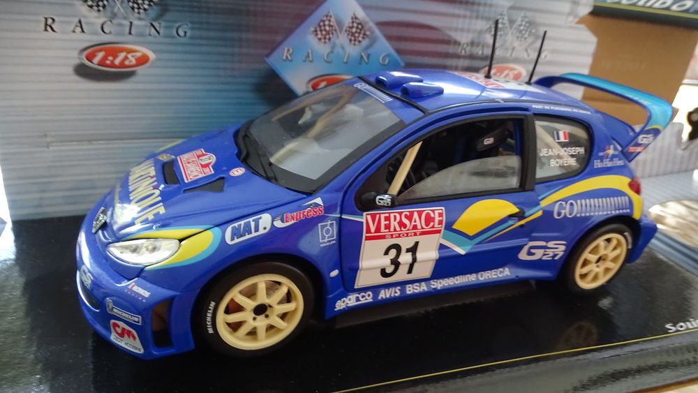 Miniatures 1/18 PEUGEOT 206 WRC de chez SOLIDO Jeux / jouets