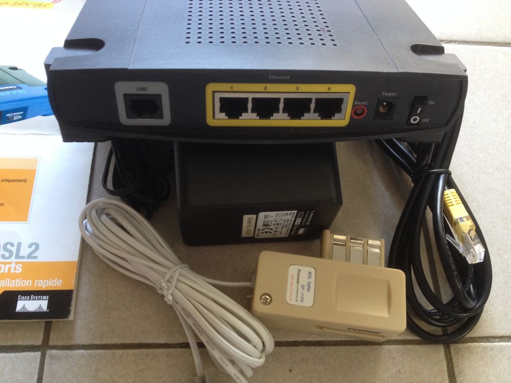 Passerelle ADSL2 &amp; commutateur 4 ports LINKSYS ( AG241 ) Matériel informatique