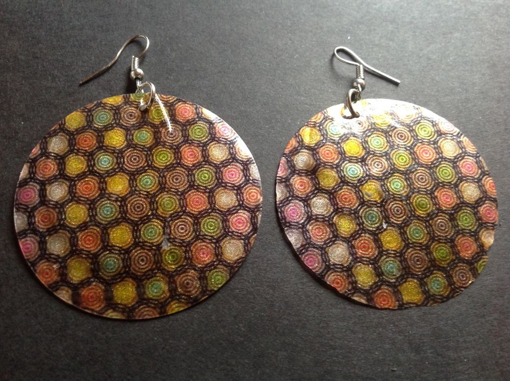 BOUCLES OREILLES FEUILLE NACR&Eacute; impr. CERCLES Envoi Possible
Bijoux et montres