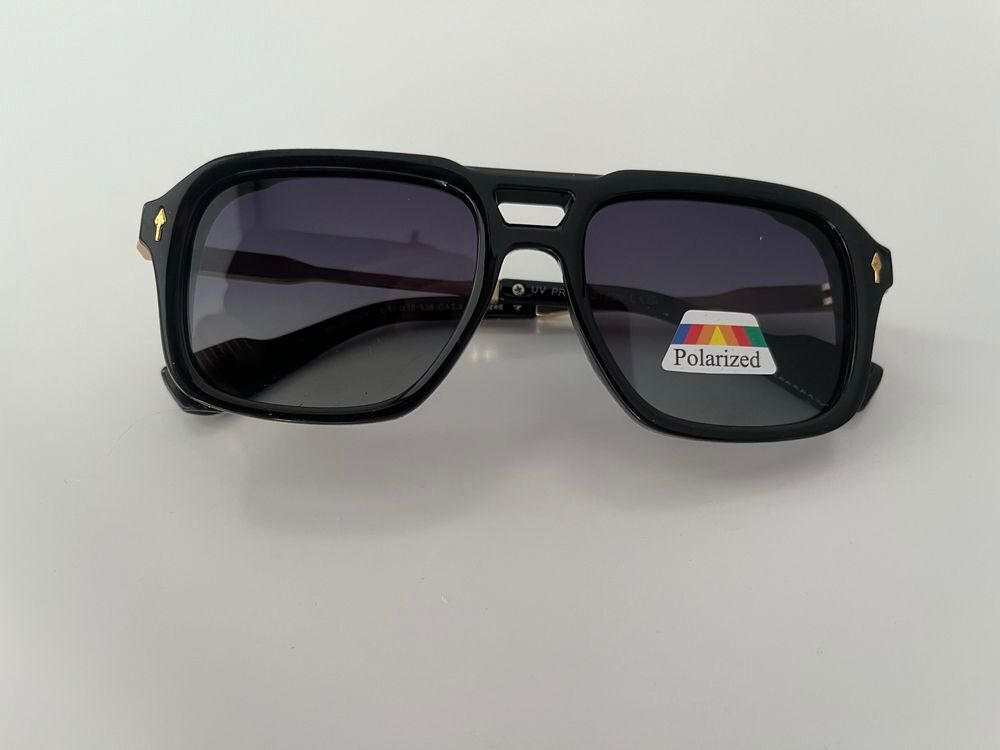 Lunettes de soleil, monture rectangulaire. Verre polariser neuve. Bijoux et montres