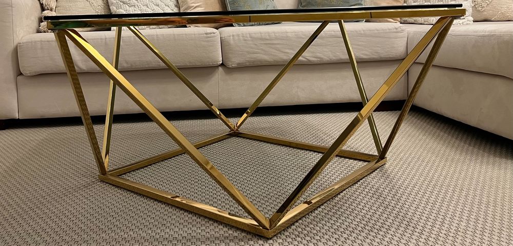 Table basse design dor&eacute; et plateau verre Meubles