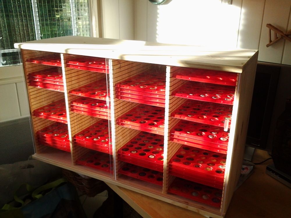 Meuble de rangement capsules de champagne 