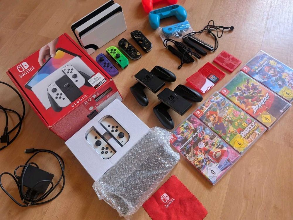 Nintendo+Switch+OLED,+mod&egrave;le+blanc,+avec+Mario+Kart+8+Deluxe+++jeux+.XXL Consoles et jeux vidéos