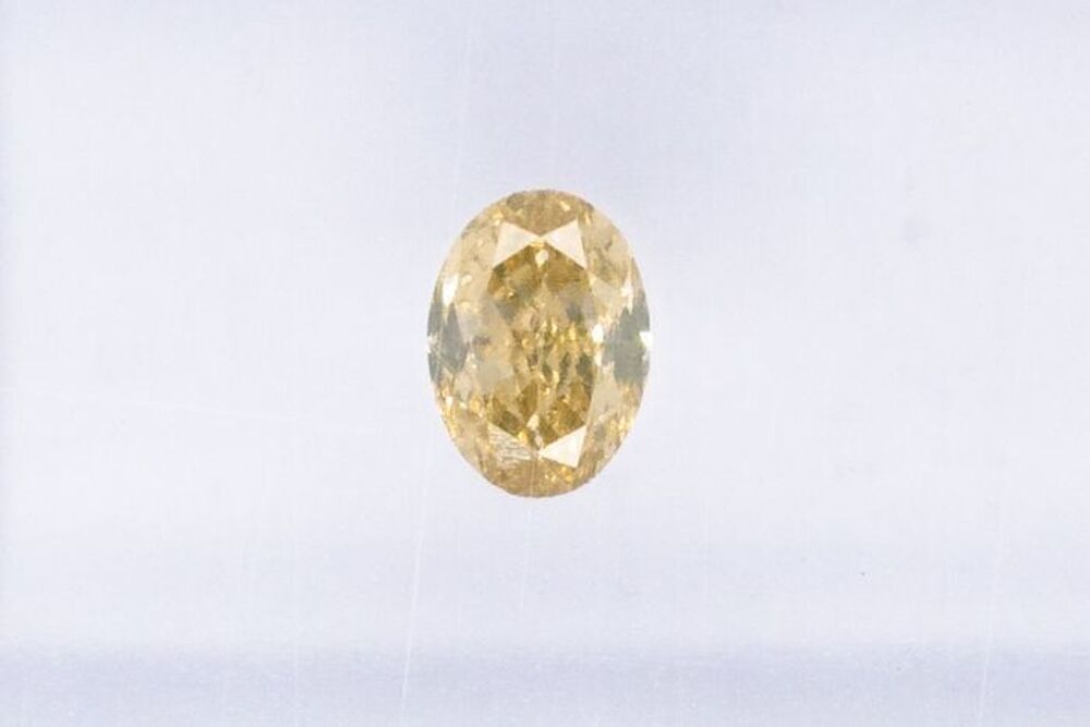 Diamant 0.24Ct, VS2, Natural fancy greenish brownish yellow Bijoux et montres
