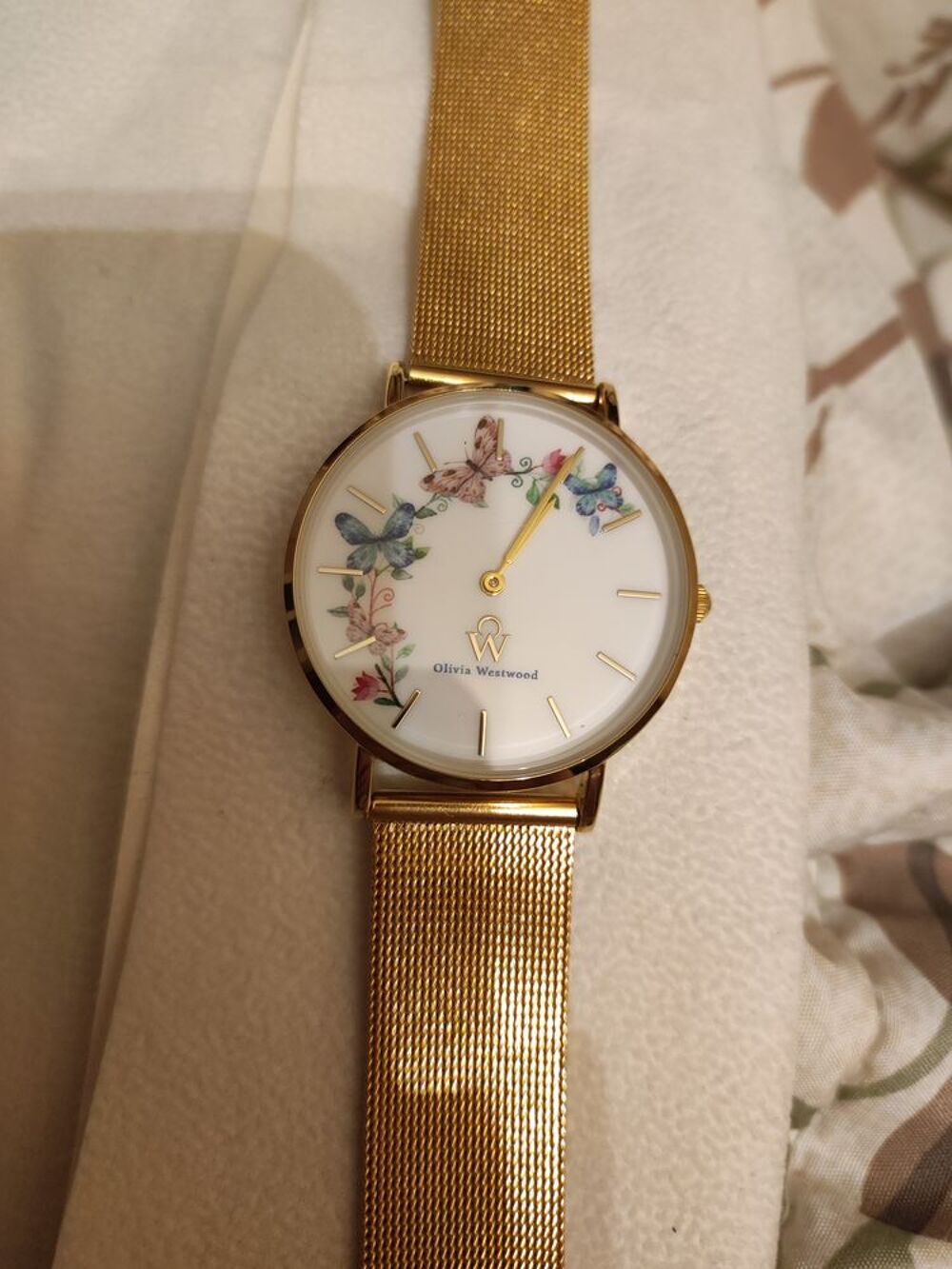 Montre acier inoxydable dor&eacute; Olivia Westwood. Neuve. Bijoux et montres