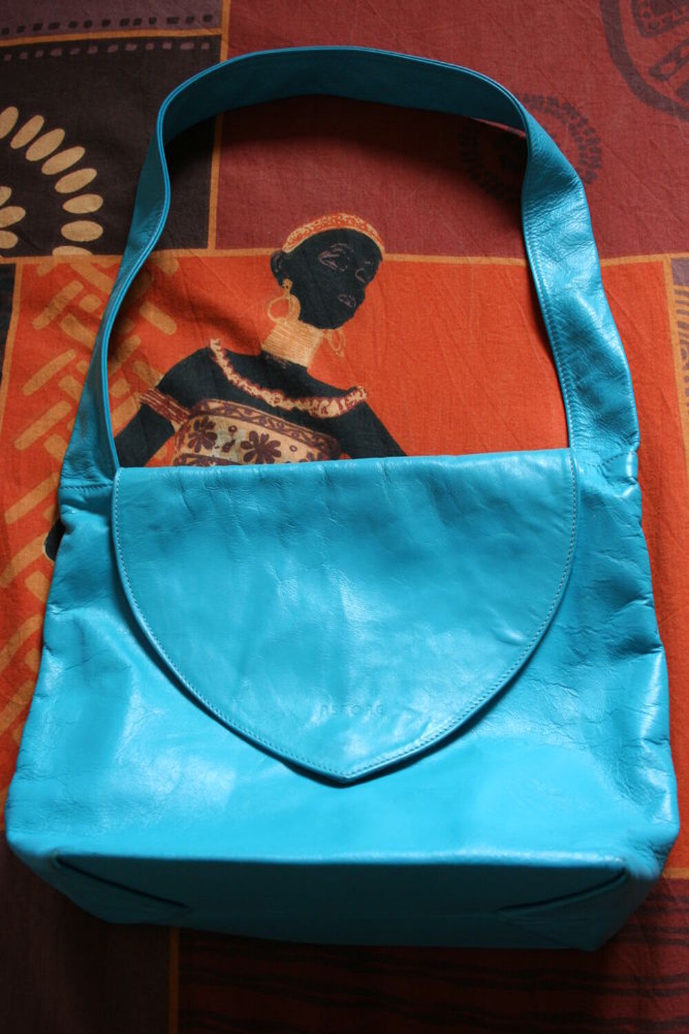 Sac &agrave; main cuir turquoise MIROTON Maroquinerie