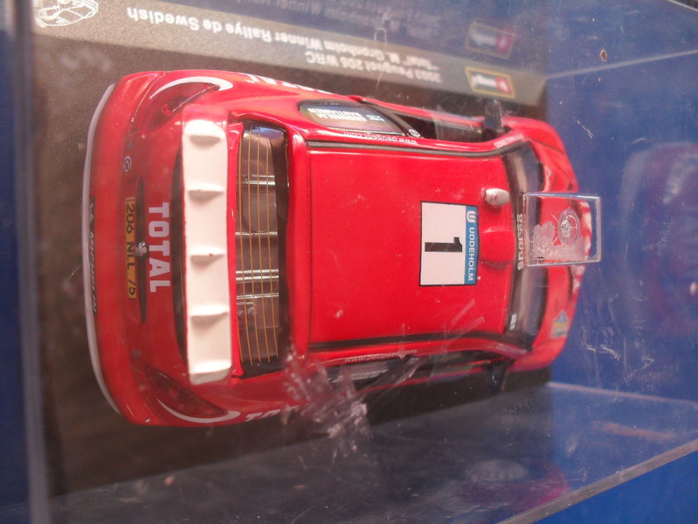 Voiture de collection burago rallye Peugeot 206 WRC 