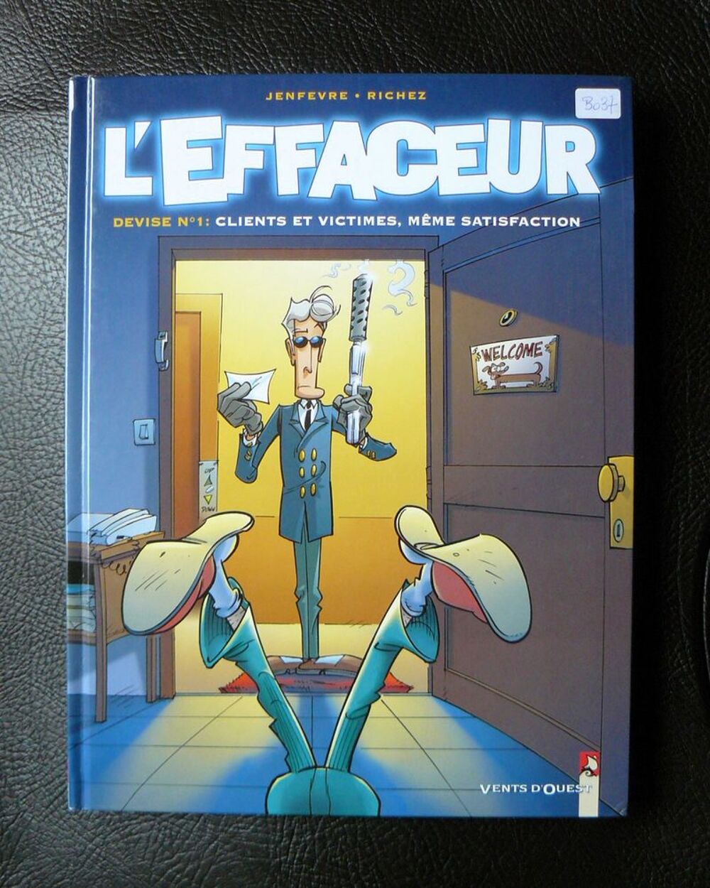 L'effaceur : Devise N&deg;1 - d&eacute;dicac&eacute; - Jenf&egrave;vre - Vents d'Oues Livres et BD