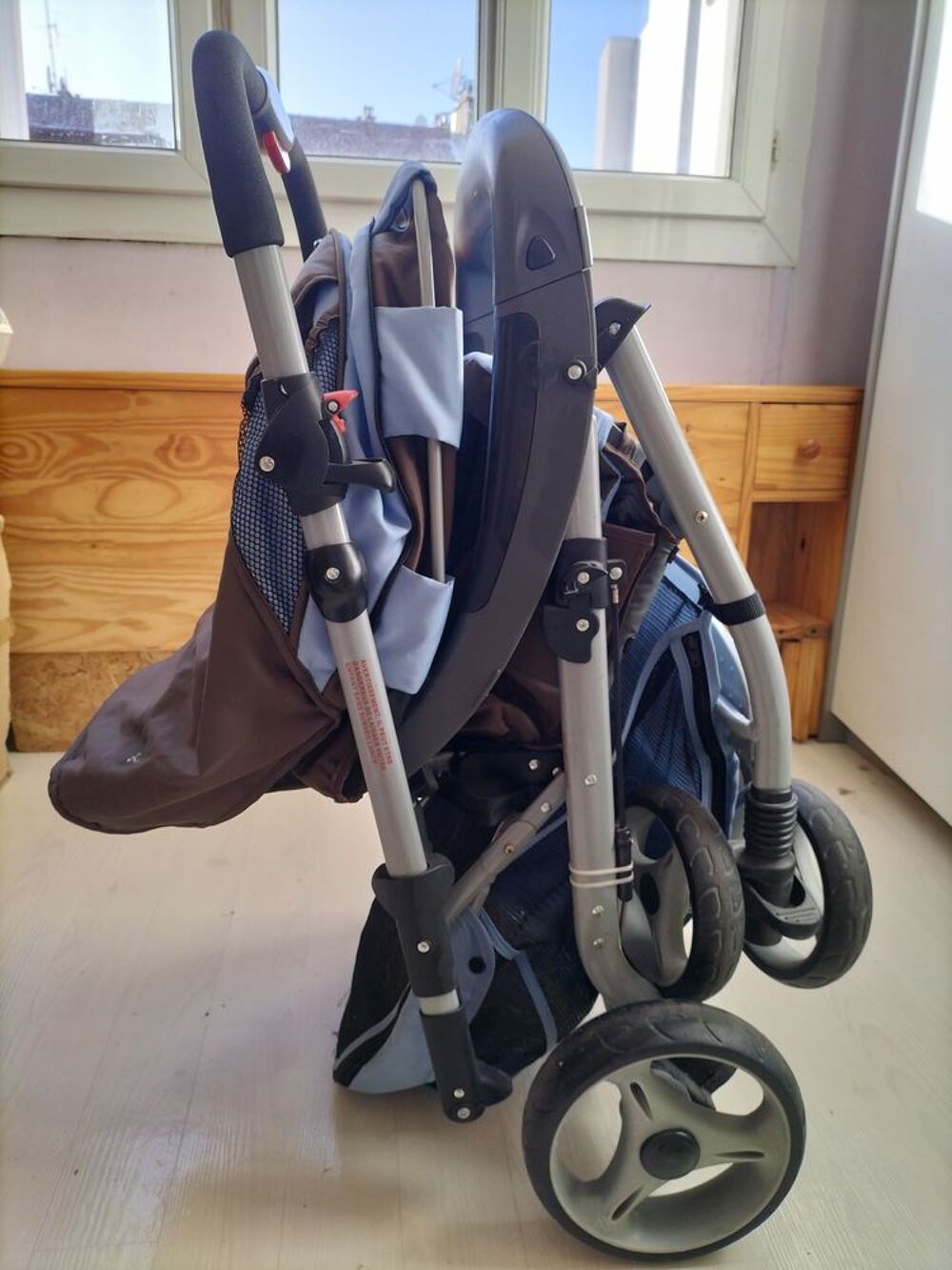 Poussette-combi bleu et marron Pu�riculture