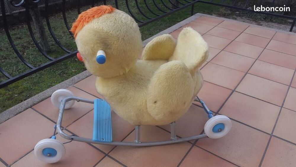 poussin jaune a roulette et bascule Jeux / jouets
