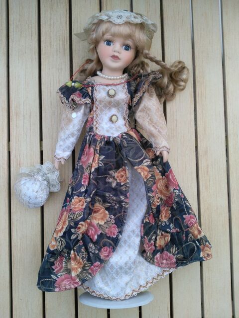 Poup�e en porcelaine avec baluchon
5 Breuillet (91)