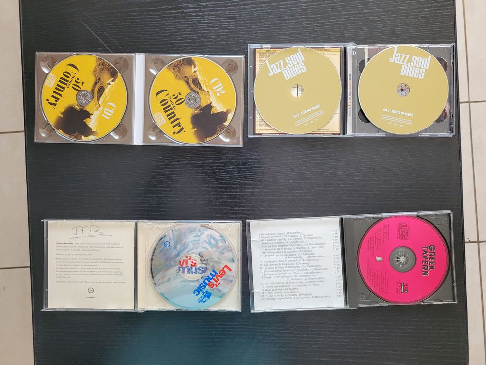 Lot de 4 CD en tr&egrave;s bon &eacute;tat CD et vinyles