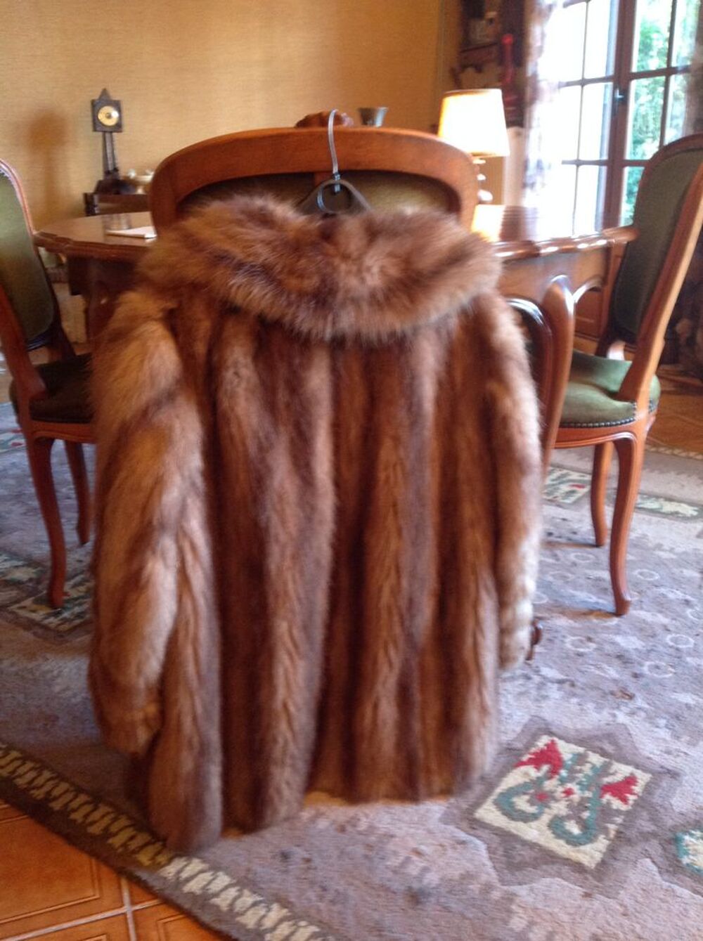Veste fourrure opossum mordor&eacute;e taille 38/40 Vêtements