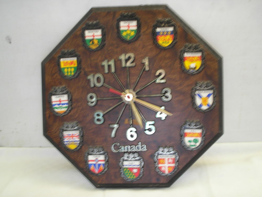 PENDULE" ECUSSONS DU CANADA" Décoration