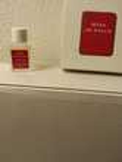 Adorable ancienne miniature parfum Miss de Rauch . 