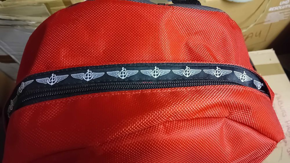Breitling 1884 sac a dos rouge tbe 