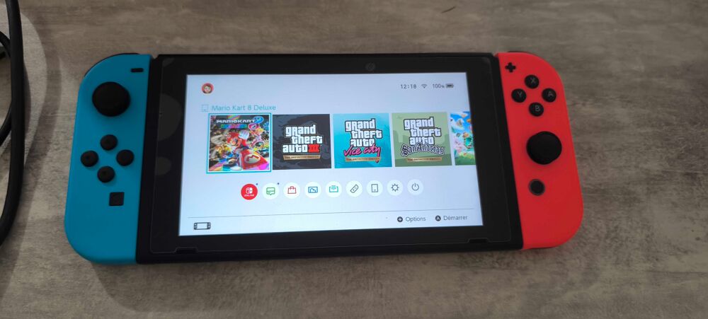 Nintendo Switch+ pochette de transport Consoles et jeux vidéos