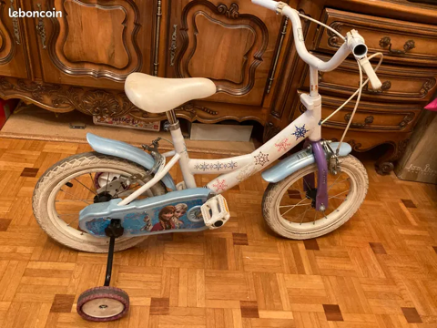 Vlo enfant reine des neigeDisney avec petites roulettes 4-6 50 Nice (06)