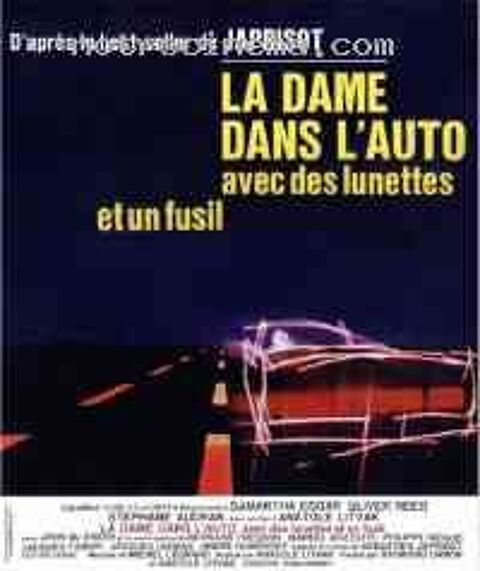 LA DAME DANS L'AUTO AVEC DES LUNETTES.... Épinal (88)