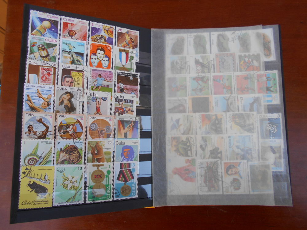 BRAVO - ALBUM de 717 TIMBRES du Monde 