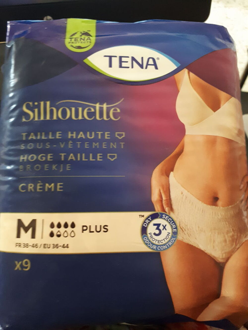 slips couches Tena silhouette couleur cr&egrave;me taille haut Vtements