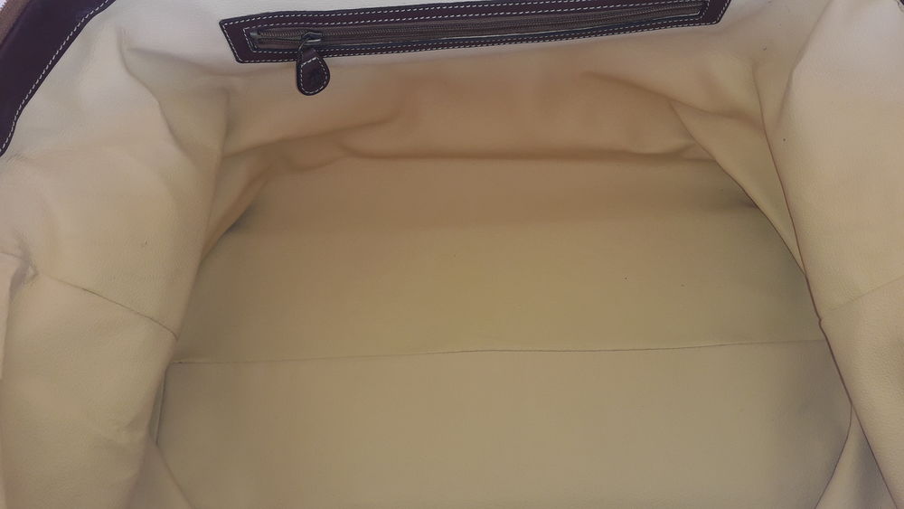 "Tr&egrave;s beau sac de voyage
Tommy Bahama"
Maroquinerie