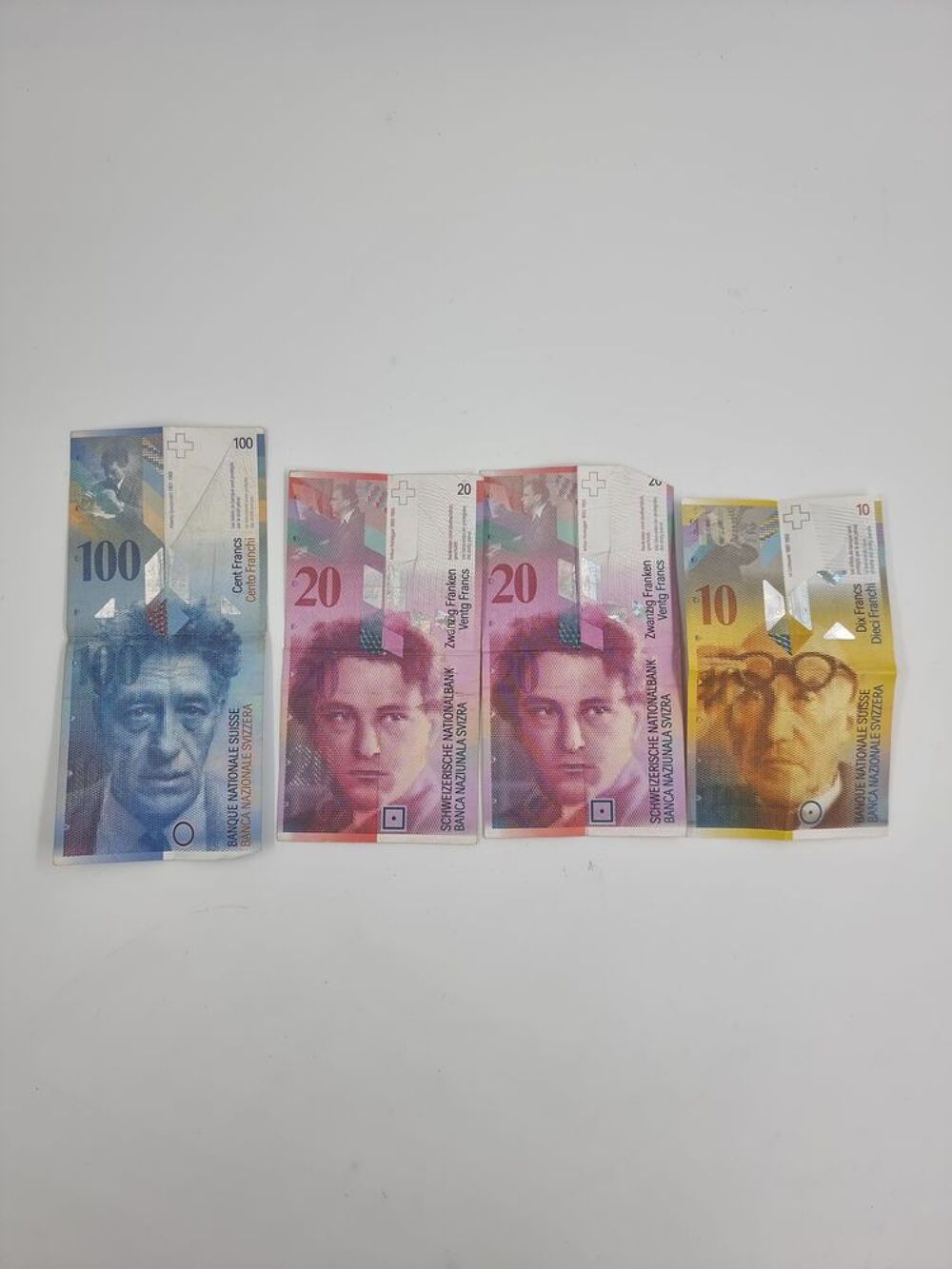 Lot de 4 anciens billets de banque franc Suisse 