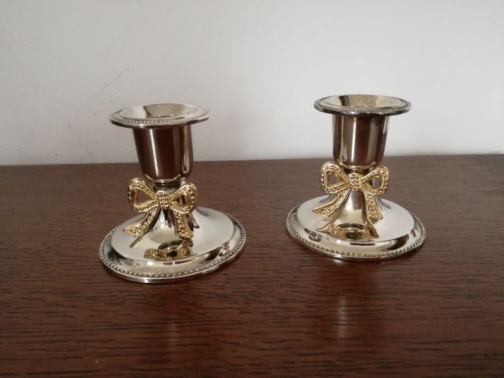 2 petits bougeoirs en argent Décoration