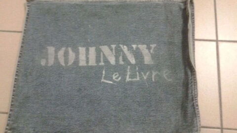 Livre fer et pochette jeans Johnny Hallyday 
100 Le Havre (76)