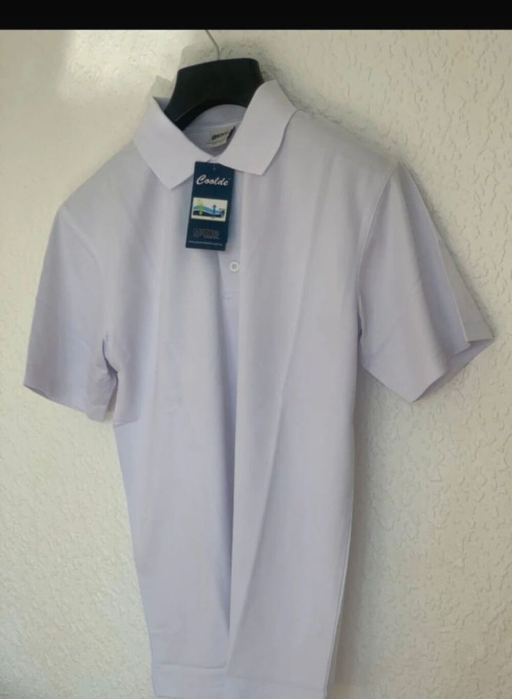 Polo blanc Marque Grace
Collection - Taille S Vêtements