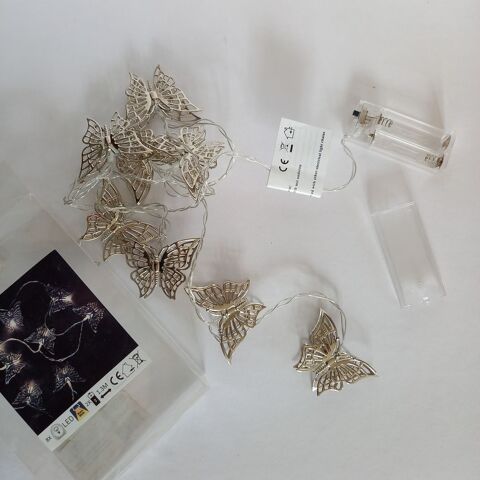 Une guirlande lumineuse led papillons couleur argent 13 Saumur (49)