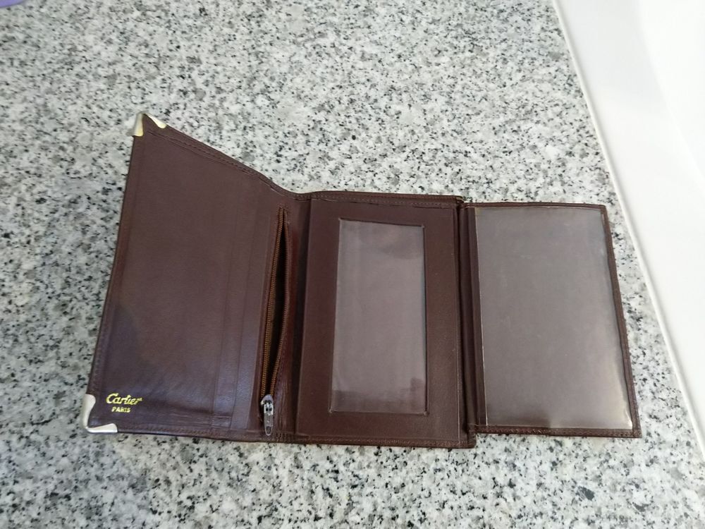 Portefeuille en cuir Cartier
Maroquinerie