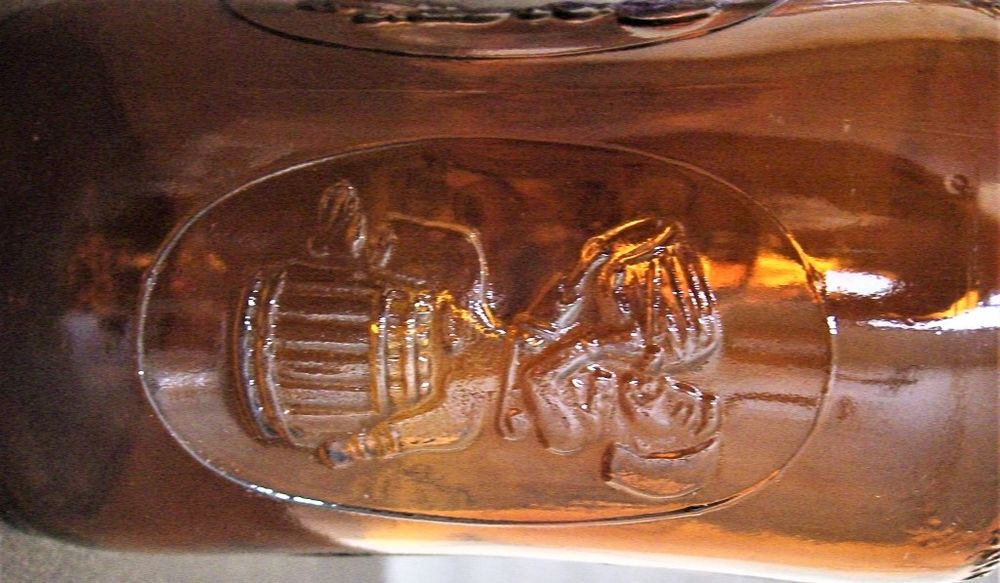 Bouteille d&eacute;cor / collection bi&egrave;re Fischer relief 4 faces Décoration