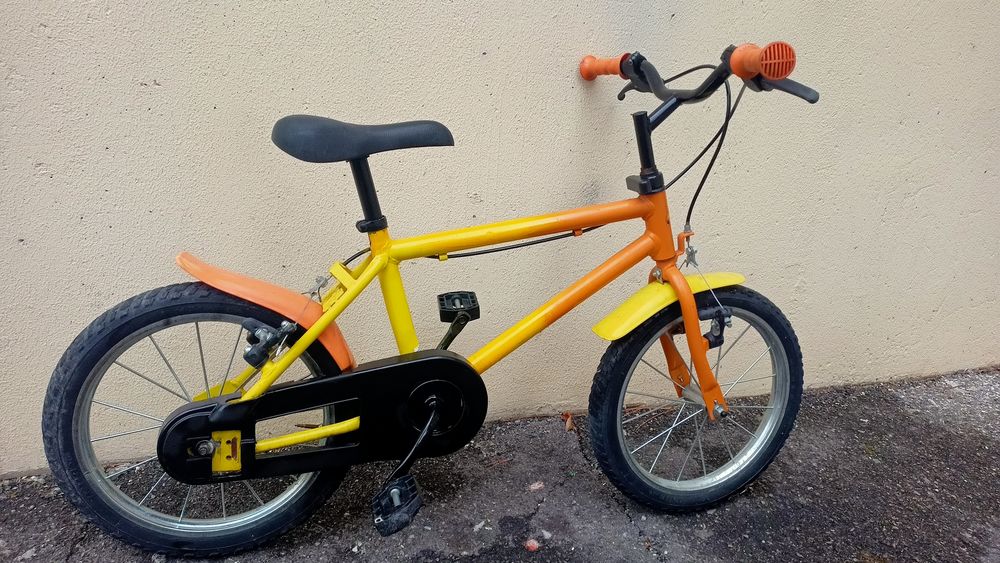 velo 16 pouces jaune orange 
Vélos