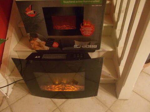 Chemin�e �lectrique nf t�l�commande faire  prix  70 Saran (45)