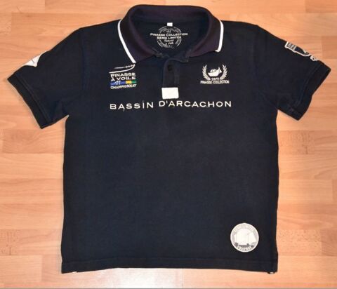 Polo bleu marine. 12 ans. PINASSE Collection. Tr�s bon �tat
20 Gujan-Mestras (33)