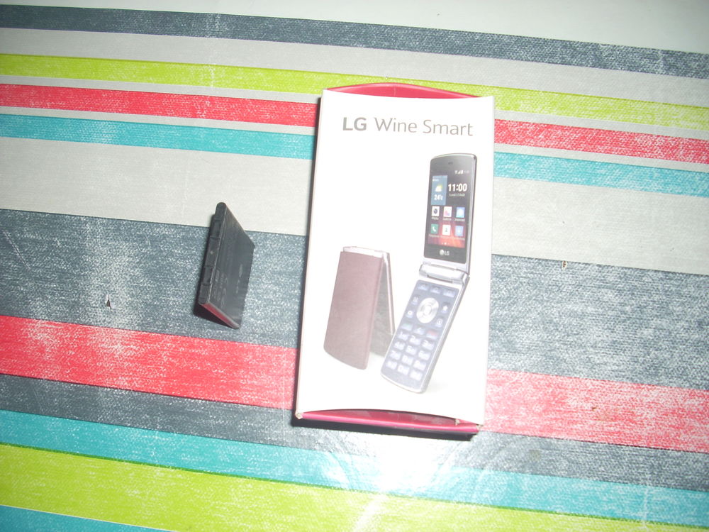 Batterie origine LG . Wine Smart Téléphones et tablettes