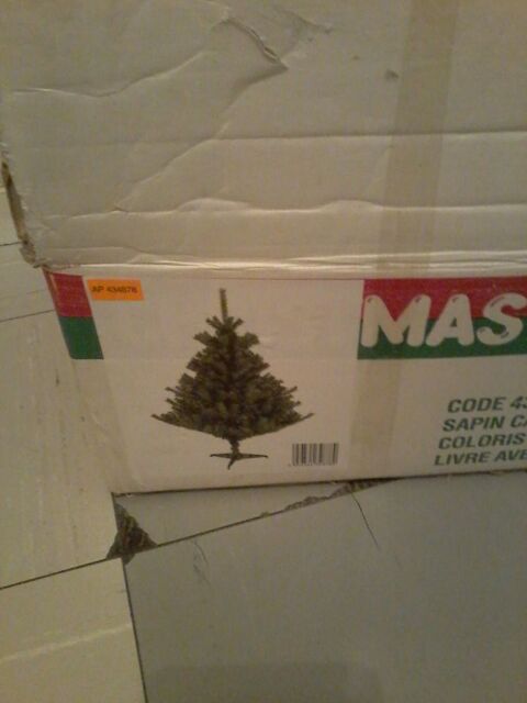 Sapin de no? l artificiel  avec support  dans emballages 35 Tourcoing (59)