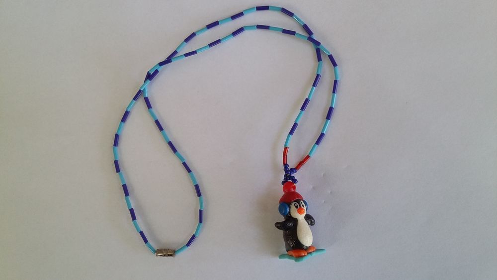 Pendentif , collier avec un pingouin Bijoux et montres