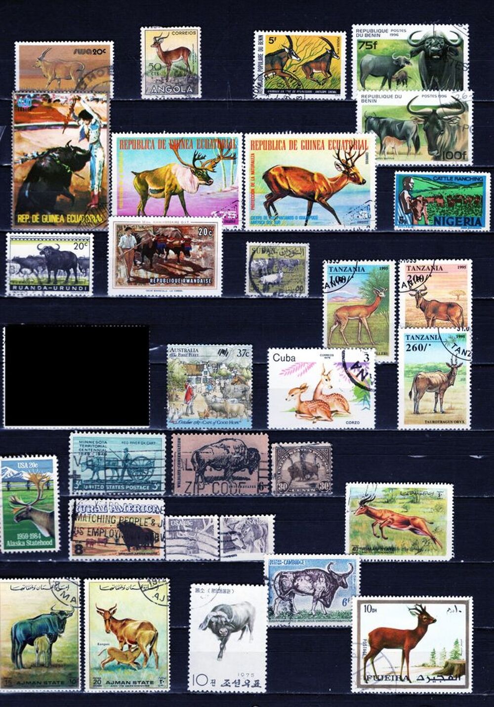lot de 54 timbres du MONDE avec des BOVIDES et des CERVIDES 