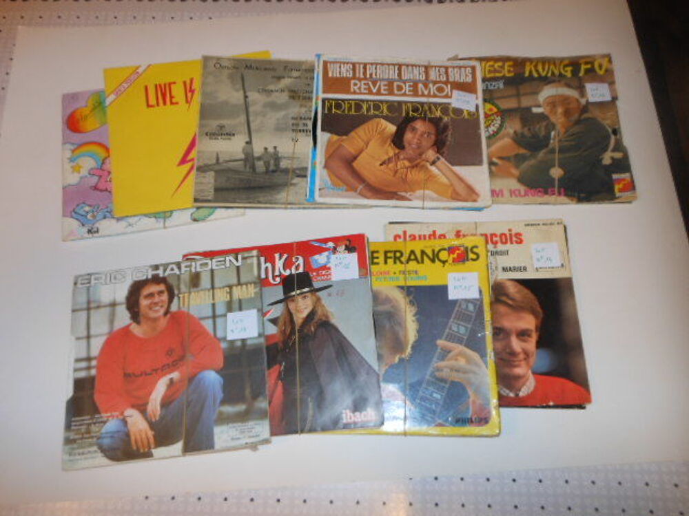 lot de 63 vinyles 45 tours 
CD et vinyles