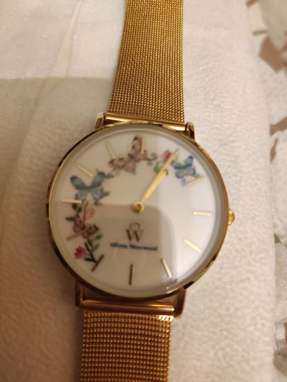 Montre acier inoxydable dor&eacute; Olivia Westwood. Neuve. Bijoux et montres