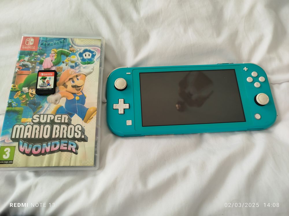 console Switch ainsi que 3 jeux Consoles et jeux vidos