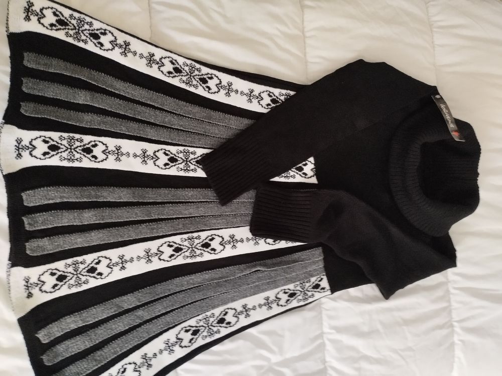 Tr&egrave;s jolie robe noire pour un r&eacute;veillon dans le froid Vêtements