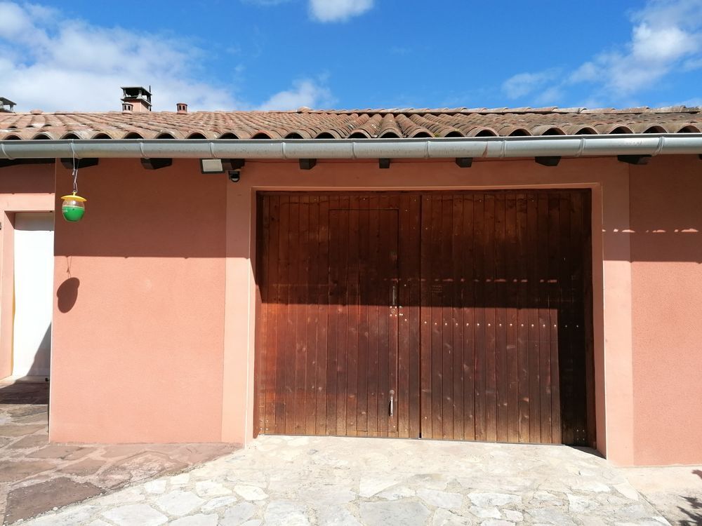 Portail de garage en bois coulissant avec isolation Bricolage