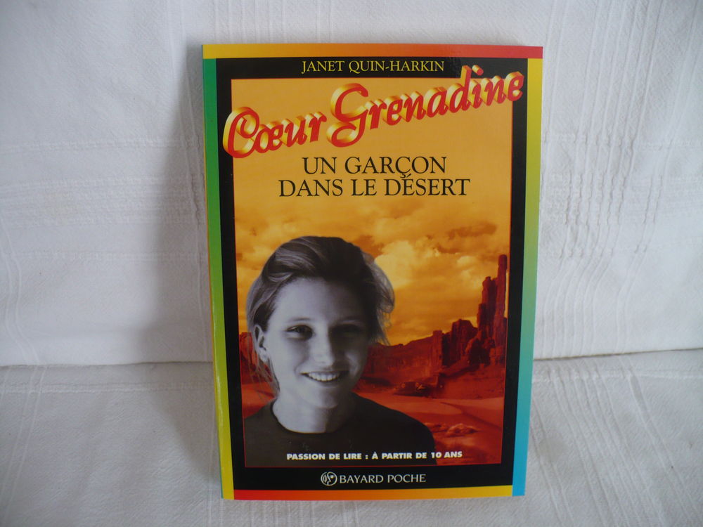 *L127 	
Coeur Grenadine Un gar&ccedil;on dans le d&eacute;sert 	 Livres et BD