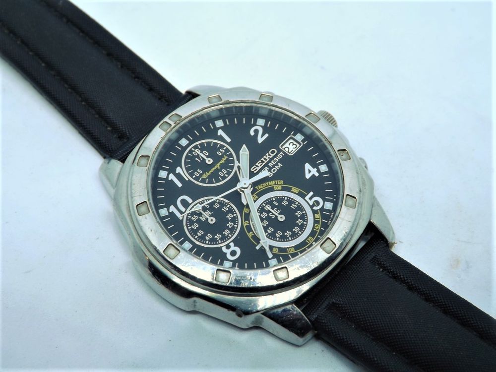 Tr&egrave;s belle chrono Seiko plong&eacute;e 1/10 sec V657-9019 1999 Bijoux et montres