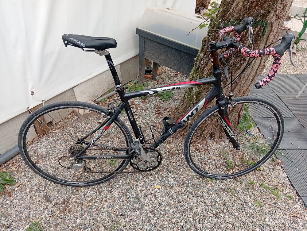 velo de route giant + chaussures Vélos