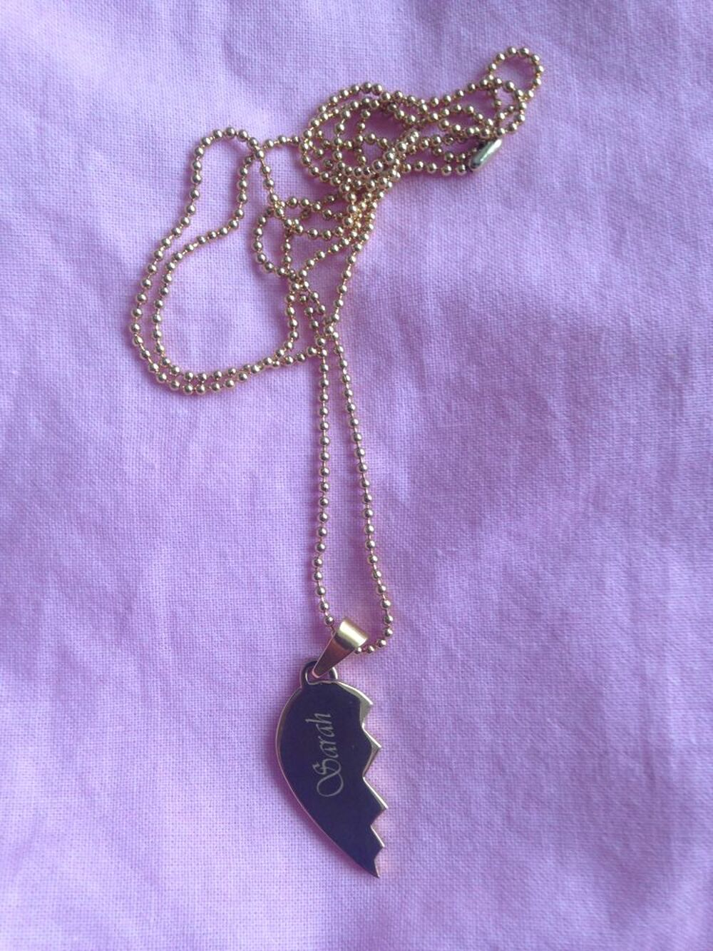 collier demi coeur Bijoux et montres